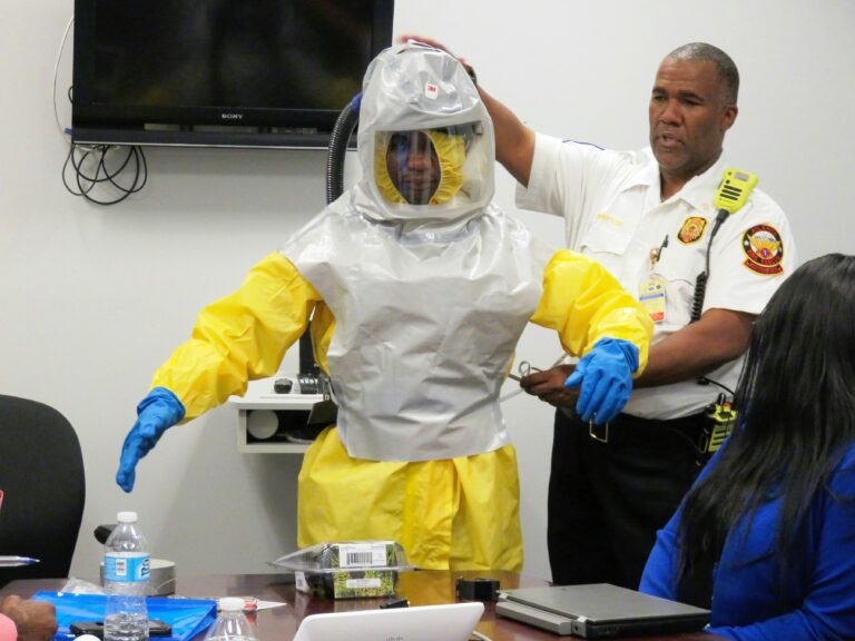 man wearing chemical protective clothing