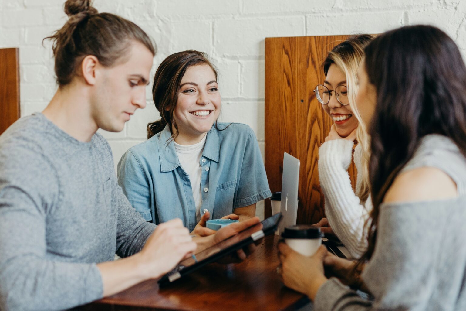 group of people discussing spend under management